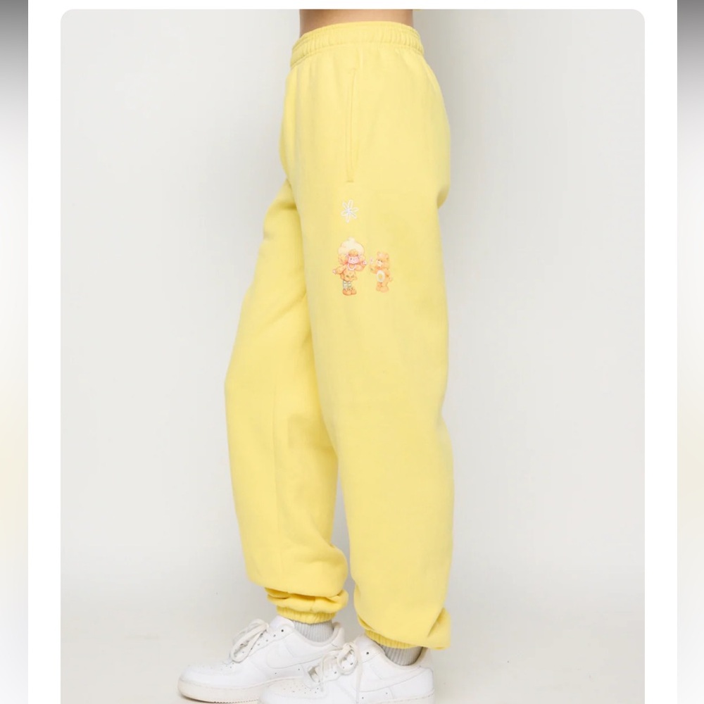 NWT L Samii Ryan Care Bears & Strawberry Shortcake Offer Kindness Yellow Joggers - Picture 3 of 10